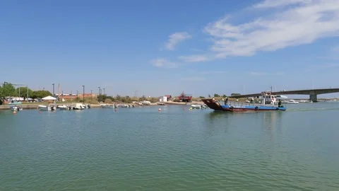 Garbage boat navigating into the river Stock Footage 285138411