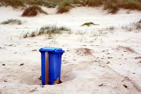 Garbage can in the dunes Stock Photos