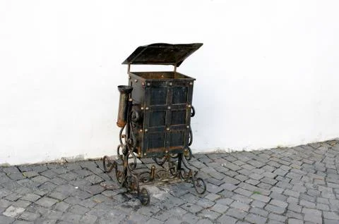 Garbage can with forged patterns. Stock Photos