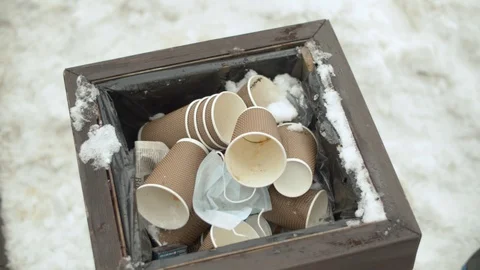 Garbage can full of paper cups Stock Footage 127684961