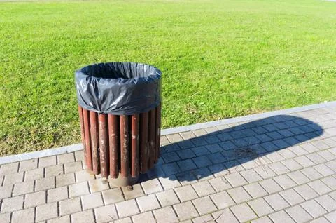 Garbage can in park Stock Photos