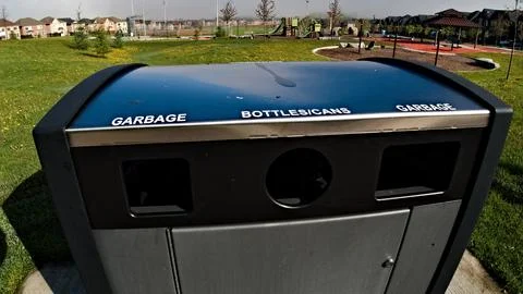 Garbage Can in Park Stock Photos