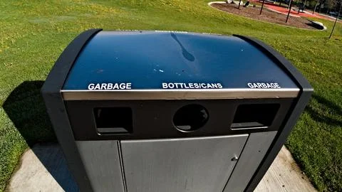 Garbage Can by Sidewalk in Toronto Stock Photos