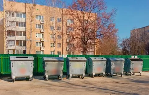 Garbage cans in the yards. Stock Photos
