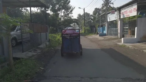 Garbage carts pulled by motorbikes  Stock-Footage 197621416