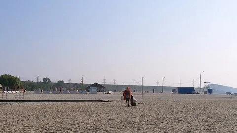 Garbage collection on the beach Stock Footage 114130523