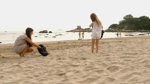 Garbage collection by the sea Stock Footage 127558887