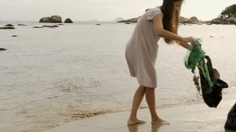 Garbage collection by the sea Video stock 127565097