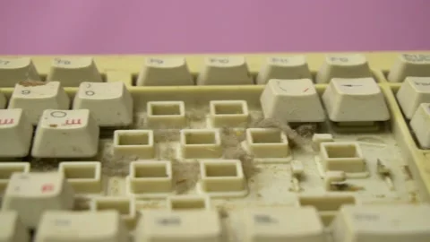Garbage concept. Old computer keyboard with dirty buttons. Dust and dirt unde Stock Footage 218578706