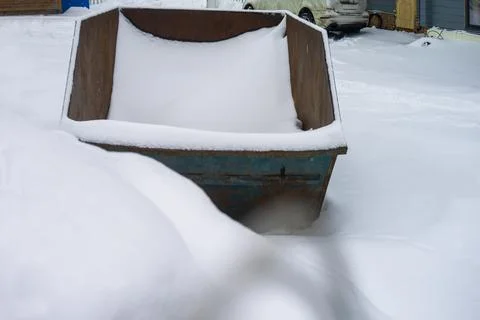 Garbage container full of snow Photos