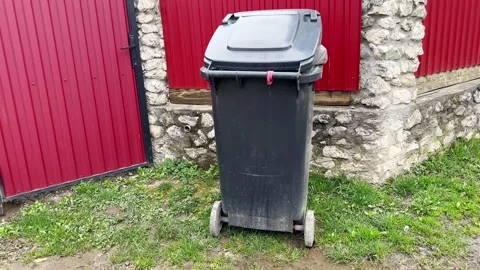 Garbage container near the house Stock Footage 238862595