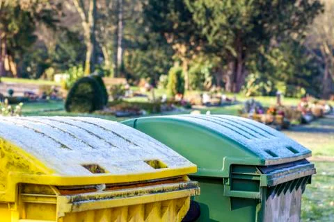 Garbage container in the park of the city cemetry Stock Photos