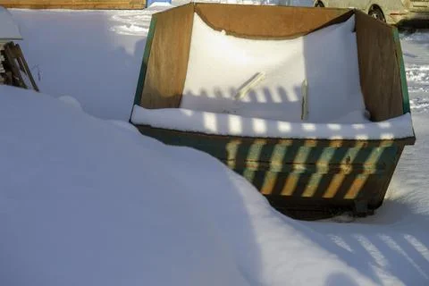 Garbage container with snow 写真素材