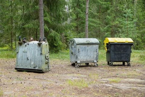 Garbage containers in the forest - keep forest clean in Lithuania Stock Photos