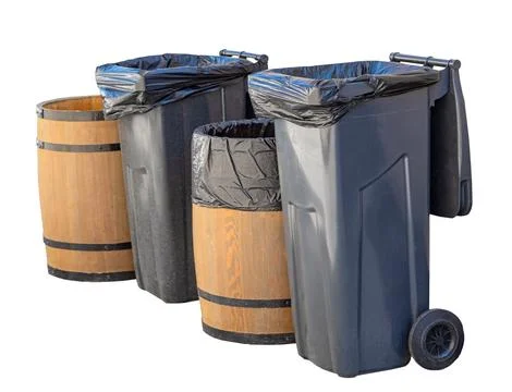 Garbage containers isolated over white Stock Photos
