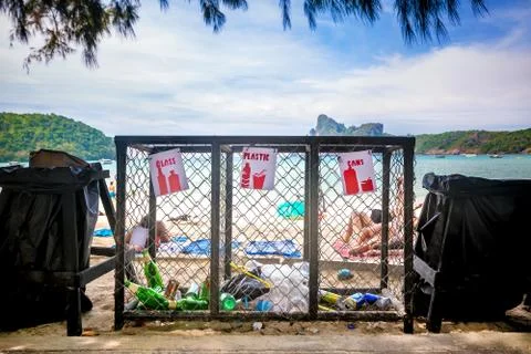 Garbage containers for separate waste collection on the tropical beach near p Stock-Fotos