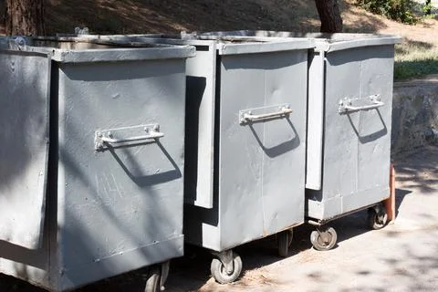 Garbage containers side by side Stock Photos
