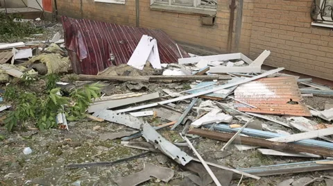 Garbage from the Destroyed Building in War Stock Footage 41495404