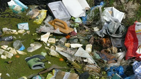 Garbage in dirty canal Stock Footage 88153404