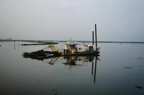Garbage dredging machine Stock Photos