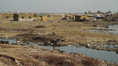 A Garbage dump on the banks of the Saloum River -  Kaolack - Senegal Stock Footage 165359218
