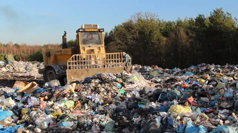 Garbage dump. Bulldozer at garbage landfill. 4 Stock Footage