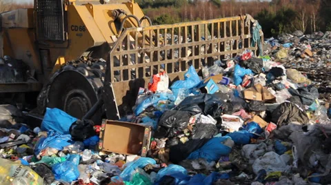 Garbage dump. Bulldozer (tractor) at garbage landfill. 9 Stock Footage
