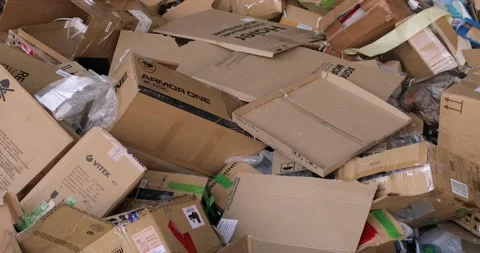 Garbage dump, cardboard boxes, for recycling. Close-up. Stock Footage 156028323