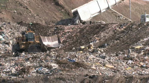 Garbage dump dozers and trucks P HD Stock Footage 128958