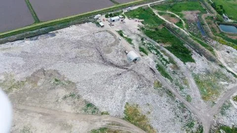 Garbage dump with heaps of garbage and treatment facilities. Landfill of garb Stock-Fotos