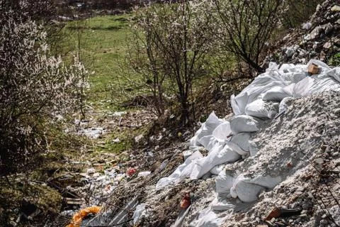 Garbage dump outdoors. environmental pollution. construction waste Stock Photos