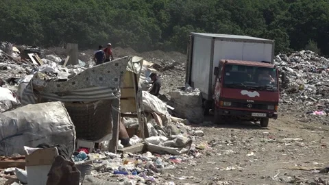 Garbage dump. People will take out the garbage.Uzhhorod. Ukraine - June 22, 2020 Stock Footage 143908001