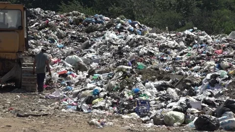 Garbage dump. People will take out the garbage.Uzhhorod. Ukraine - June 22, 2020 Stock Footage