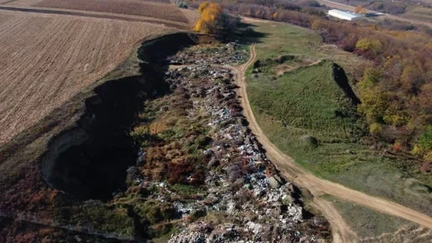 Garbage dump with plastic bags and food waste Stock Footage 252943808