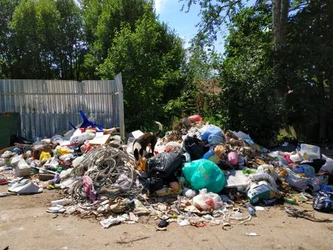 Garbage dump in residential area Stock Photos