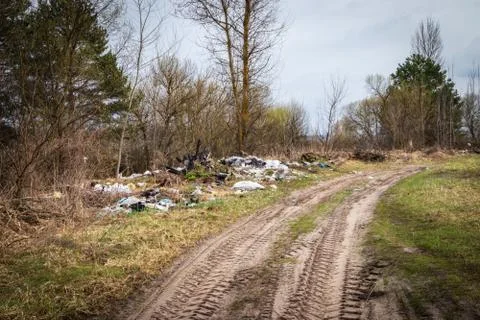 Garbage dump on the side of the road Stock Photos