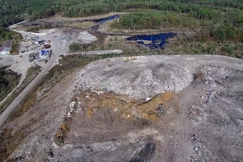 Garbage dump, top view of trash. Landfill. Stock Photos