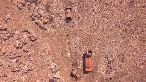 Garbage dump top view working people and bulldozers. Ukraine, the environmental Stock Footage 137496811