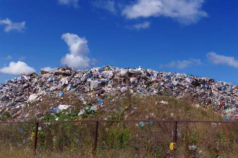 Garbage dump. Unsorted waste. Environmental pollution. Stock Photos