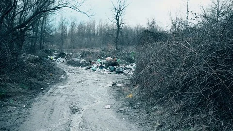 Garbage on the end of the road in the countryside Vídeo Stock 92303944