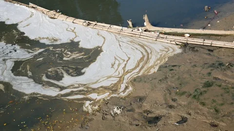 Garbage floating and polluting on water surface Stock Footage 113295185