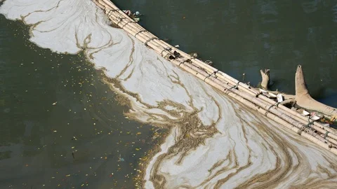 Garbage floating and polluting on water surface Stock Footage 113296142