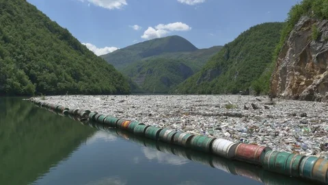 Garbage floating in a lake barrier Stock-Footage 83397151