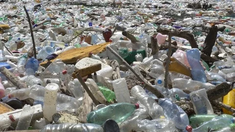 Garbage floating in a rivers 7 Stock-Footage 83397097