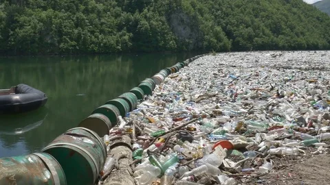 Garbage floating in a rivers 9 Stock-Footage 83397324