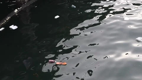 Garbage floating on the sea Stock Footage 339617980