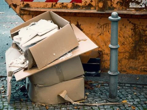 Garbage In Front of A Garbage Container In Berlin, Germany Stock Photos