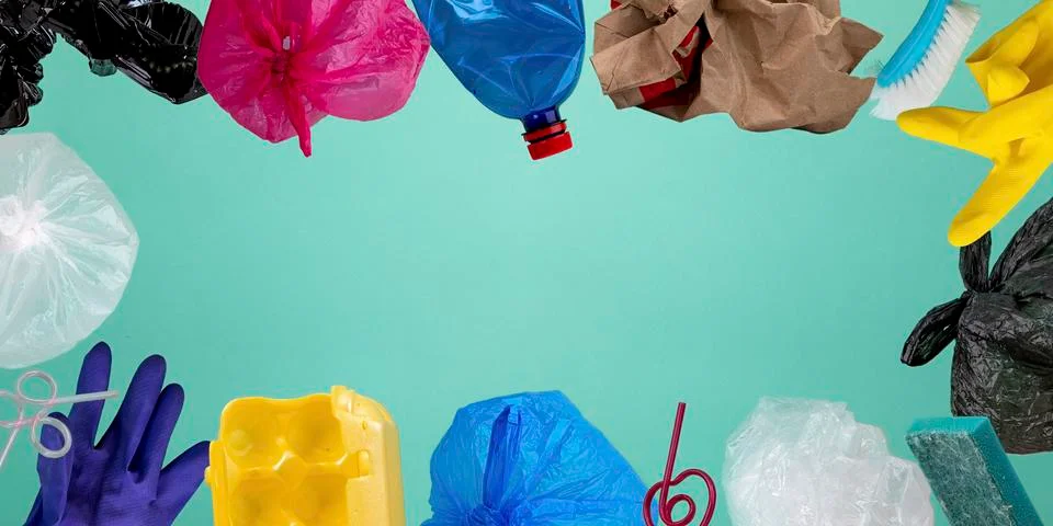Garbage on green background 스톡 사진