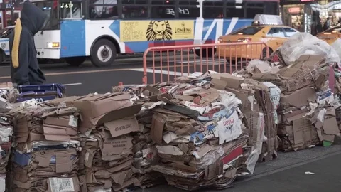 Garbage lining the streets of Times Square NYC Stock Footage
