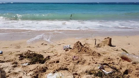 Garbage is lying on the beach among the sand Stock Footage 108719710